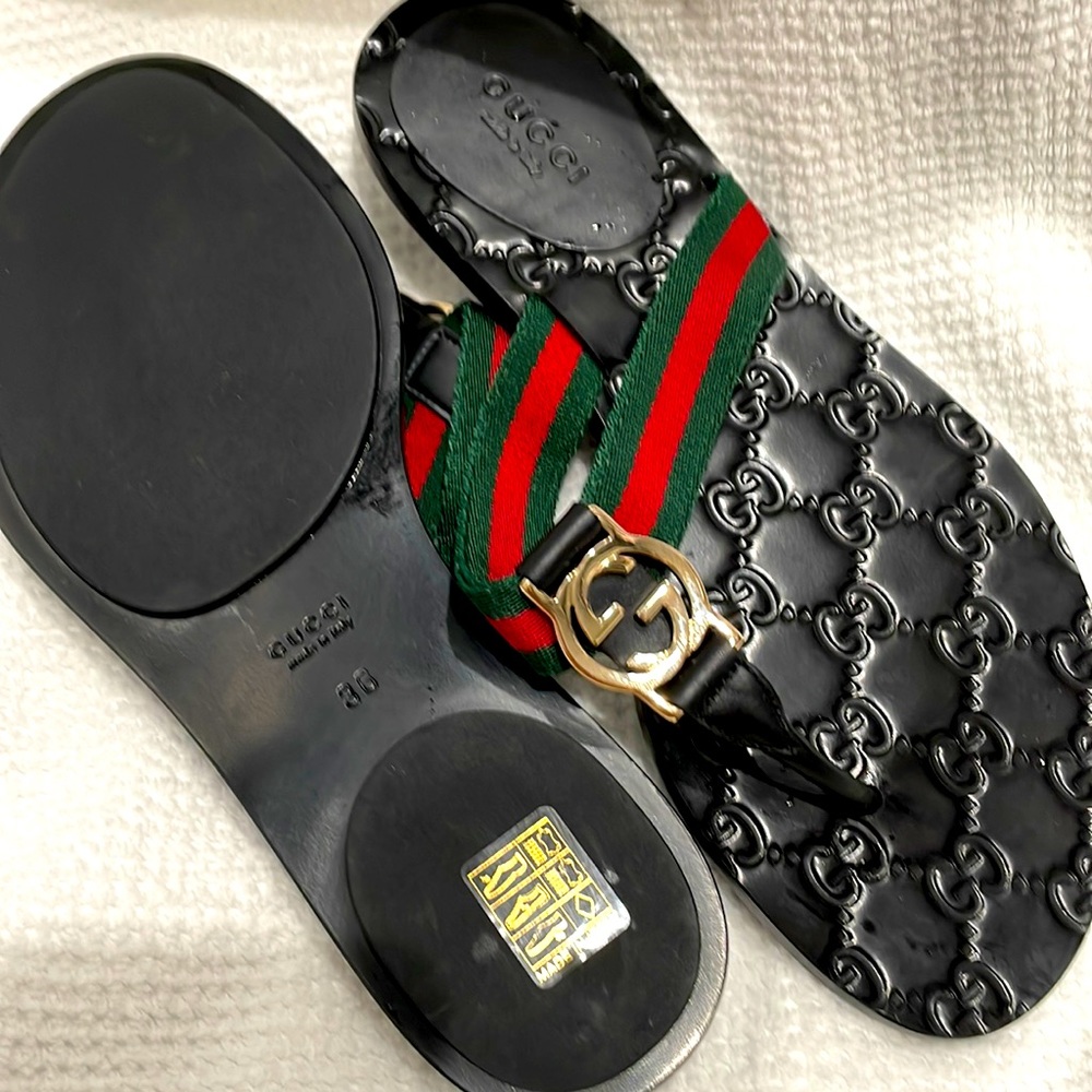 Rand new, never worn Gucci Flip Flops